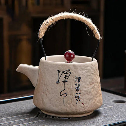 White ceramic teapot with Japanese writing design