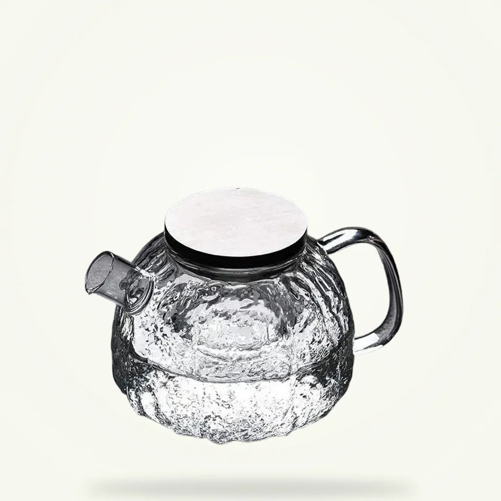 Japanese glass teapot 1.1L with stainless steel infuser on plain background