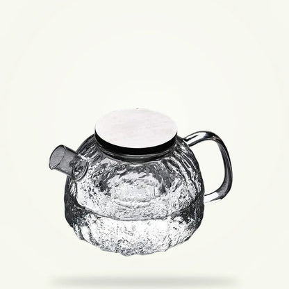 Japanese glass teapot 1.1L with stainless steel infuser on plain background
