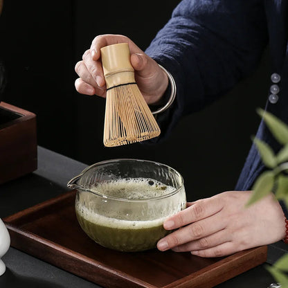 Bamboo chasen whisk and chashaku scoop with wide glass matcha bowl