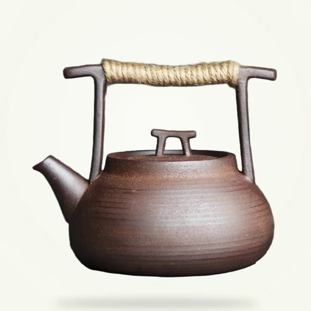 Japanese Stoneware Teapot with Rattan Handle, product photo on a plain background