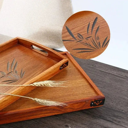 Wooden tea tray with two cups and teapot