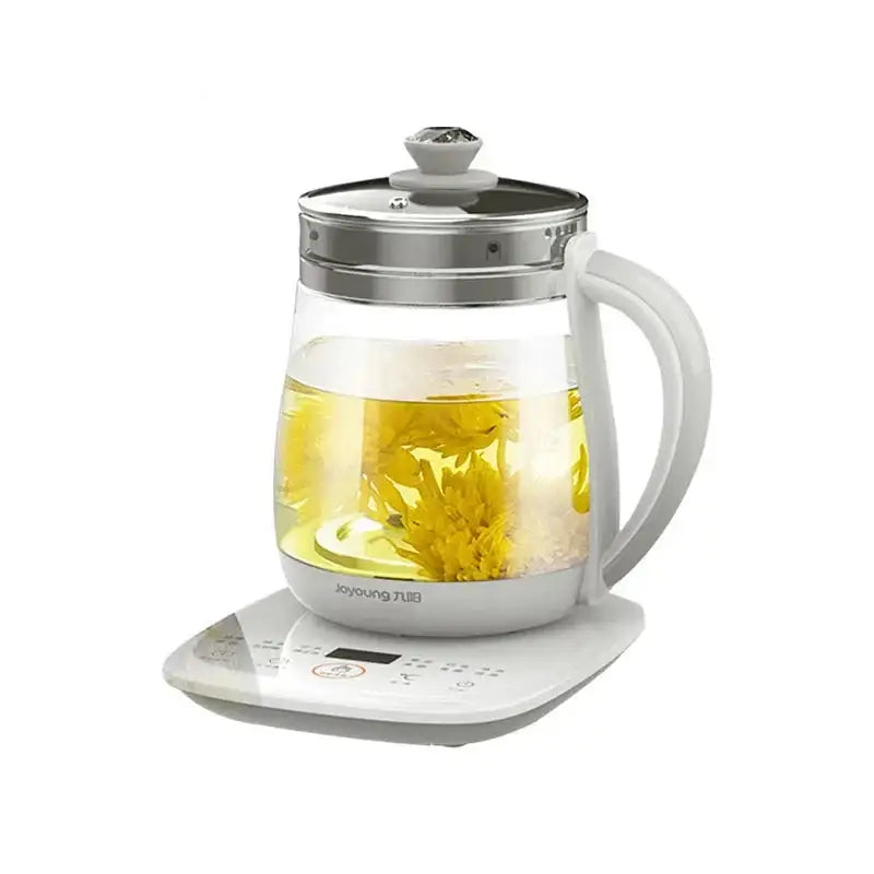 White electric teapot with glass carafe, side view