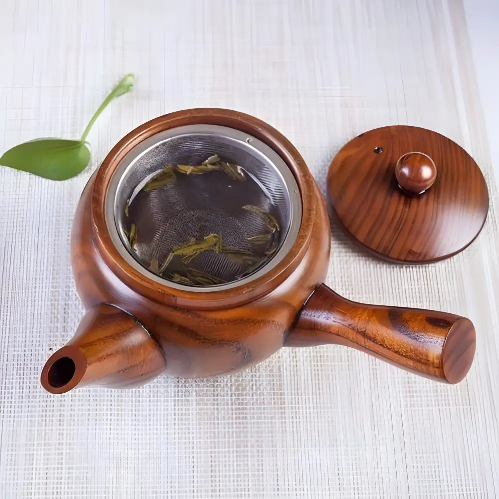 Wood kyusu teapot brewing loose leaf green tea