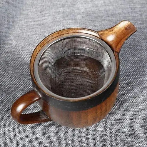 Jujube wood teapot with built-in loose-leaf tea filter shown