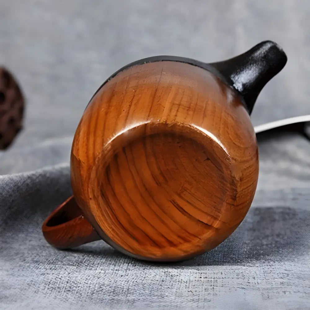 Bottom view of BPA-free jujube wood teapot showing grain detail