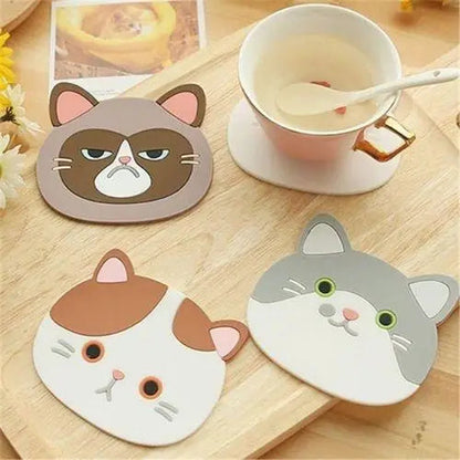 Four kawaii cat coasters in different colors