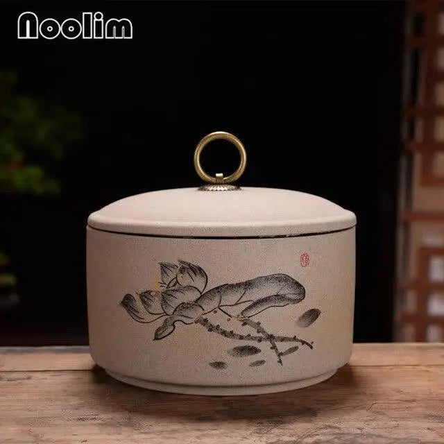 Large ceramic tea canister in color C, open with tea
