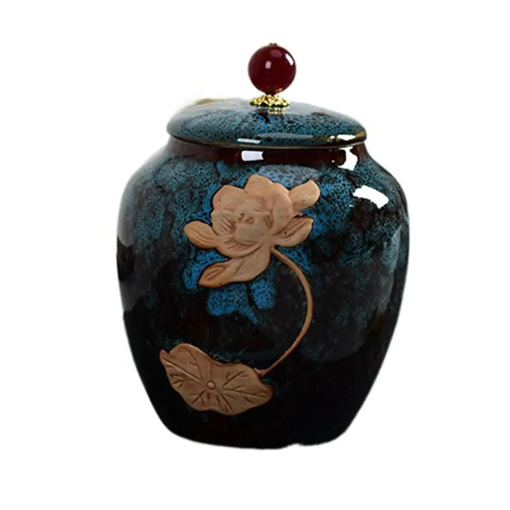 Dark blue ceramic tea storage jar, side angle showing fitted lid