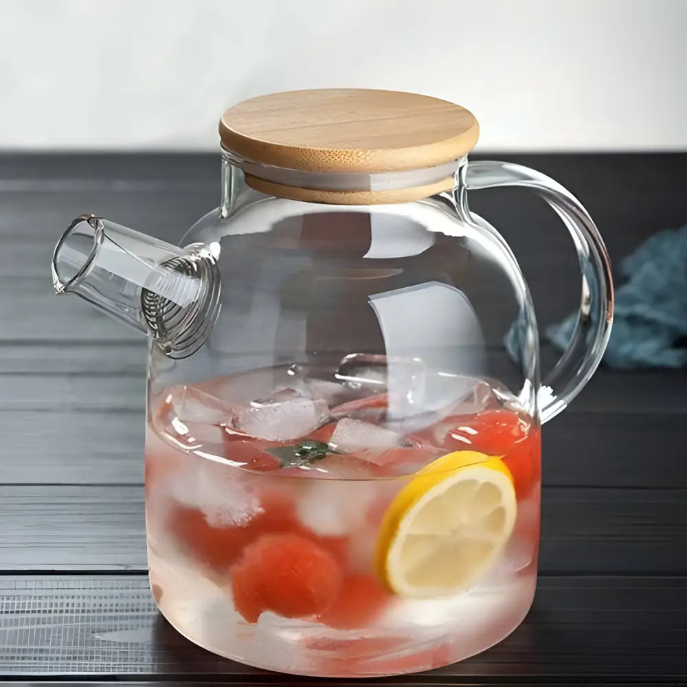Large glass teapot 54 oz size on kitchen table with tea