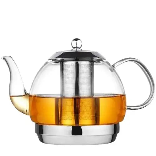 Large glass teapot with stainless steel infuser on white background