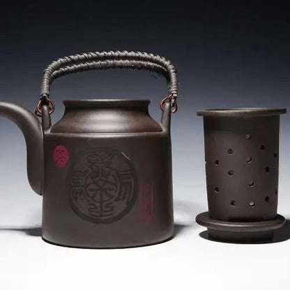 Yixing clay teapot built-in perforated strainer filter detail