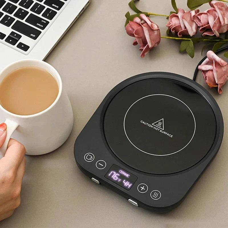 Mug warmer with teabag and steam rising from a warm cup of tea