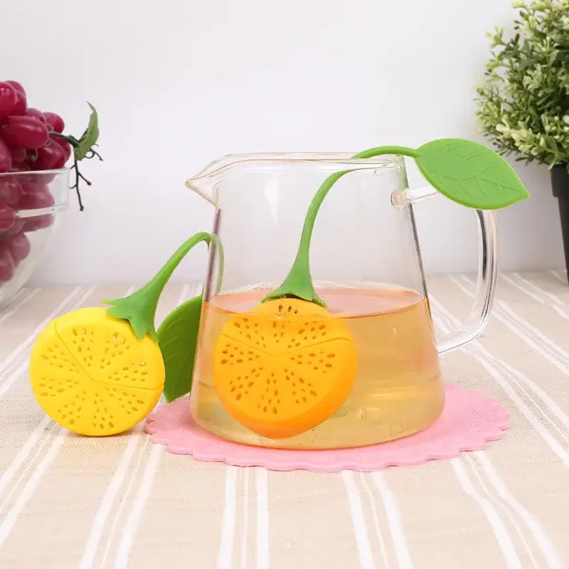 Lemon tea infuser made of yellow silicone with fine mesh strainer