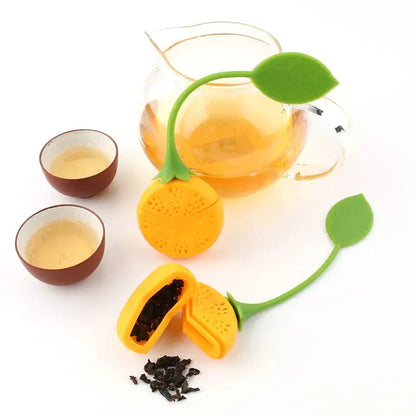 Silicone lemon tea strainer with tea leaves inside, ready to steep