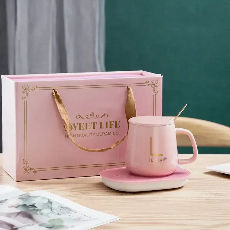 Pink ceramic mug warmer with USB cable