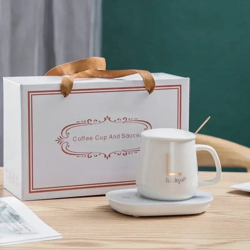 White mug warmer set with ceramic cup and spoon