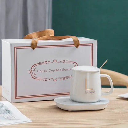 White mug warmer set with ceramic cup and spoon