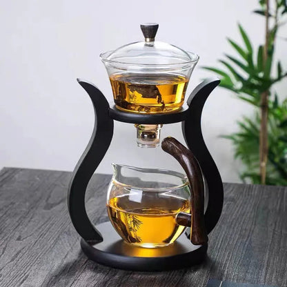 Clear glass teapot with wooden handle and magnetic infuser mechanism