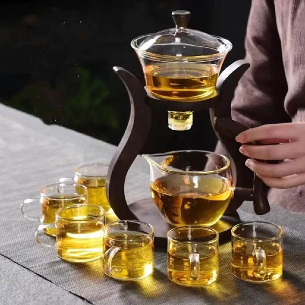 Close-up of magnetic valve detail on glass teapot with tea cup