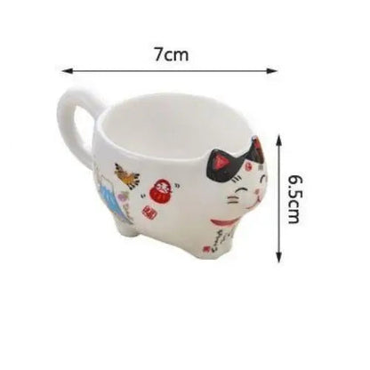 Maneki Neko porcelain cup size comparison next to hand 120 ml
