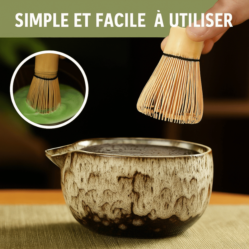 Bamboo chasen whisk and bamboo scoop resting beside ceramic matcha bowl with green tea powder