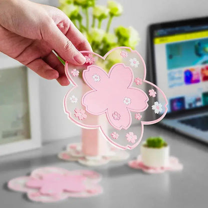 Stack of colorful tea coasters in pink and white