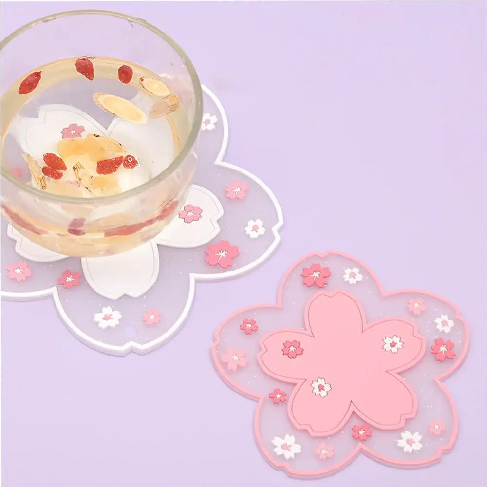 Rose colored tea coaster with teacup and saucer