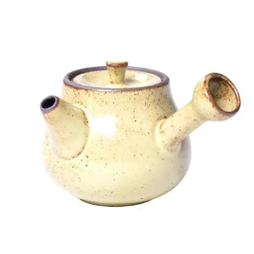 Yellow mini ceramic teapot, cheerful and cozy for tea time