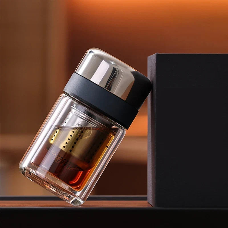 Mini double wall glass tea infuser with stainless steel filter, side view showing wall thickness