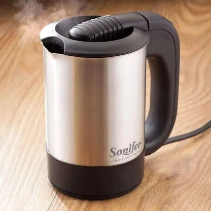 Mini electric kettle 0.5 liter cordless on counter