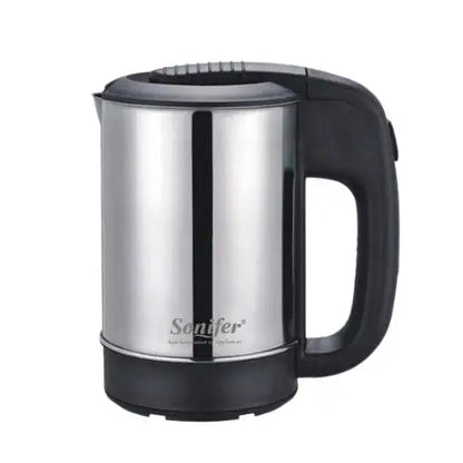 Cordless mini kettle pouring hot water into cup
