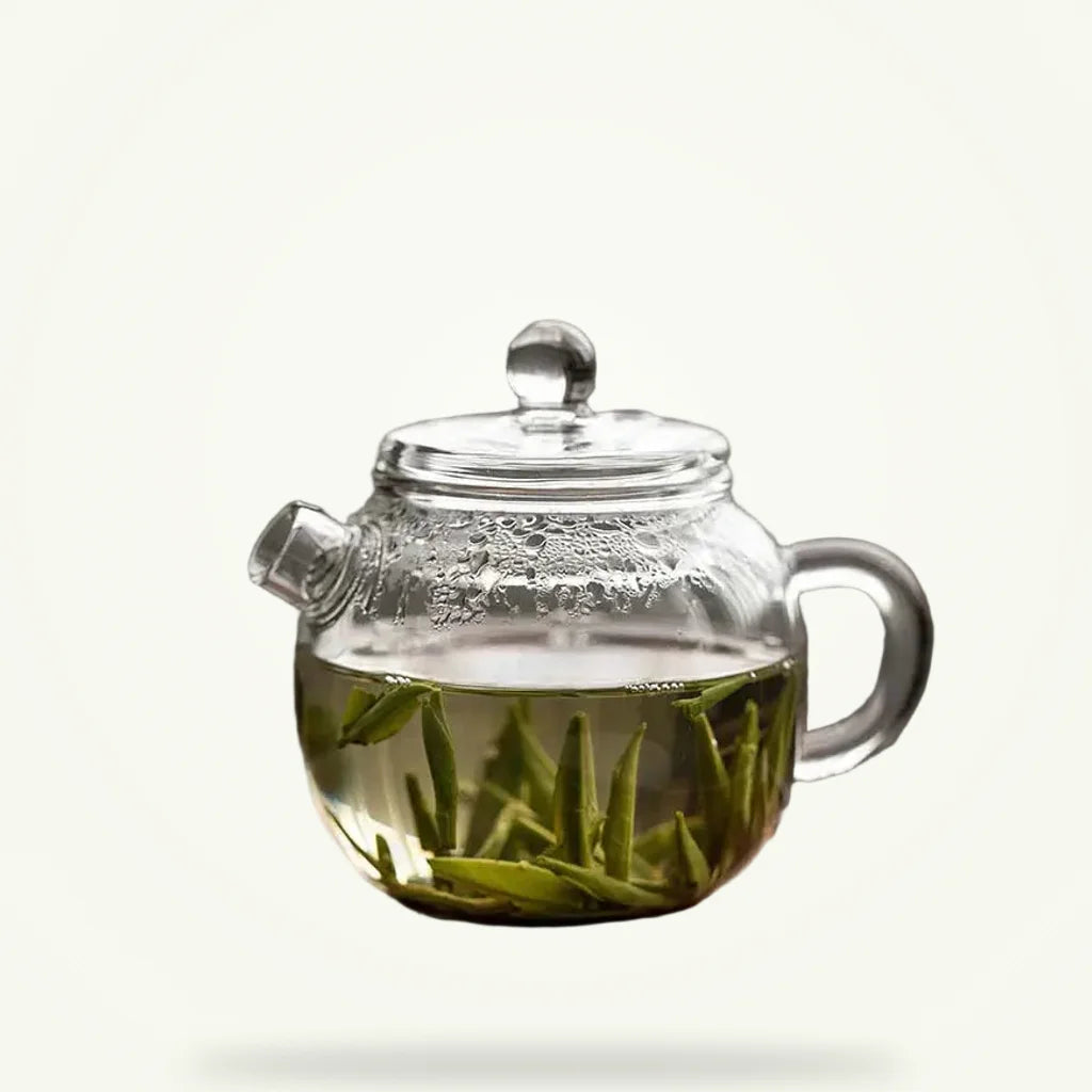 Mini Glass Teapot for One, 150ml Borosilicate Teapot, product photo on a plain background