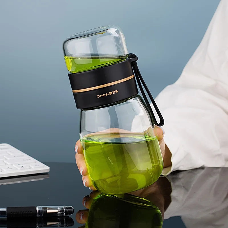 Mini glass teapot with black silicone sleeve and removable infuser