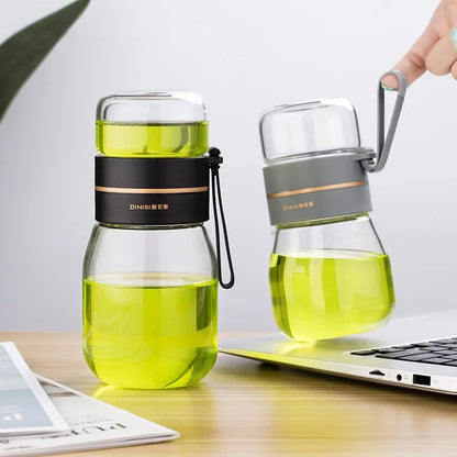 Portable 450ml glass teapot showing stainless steel filter detail
