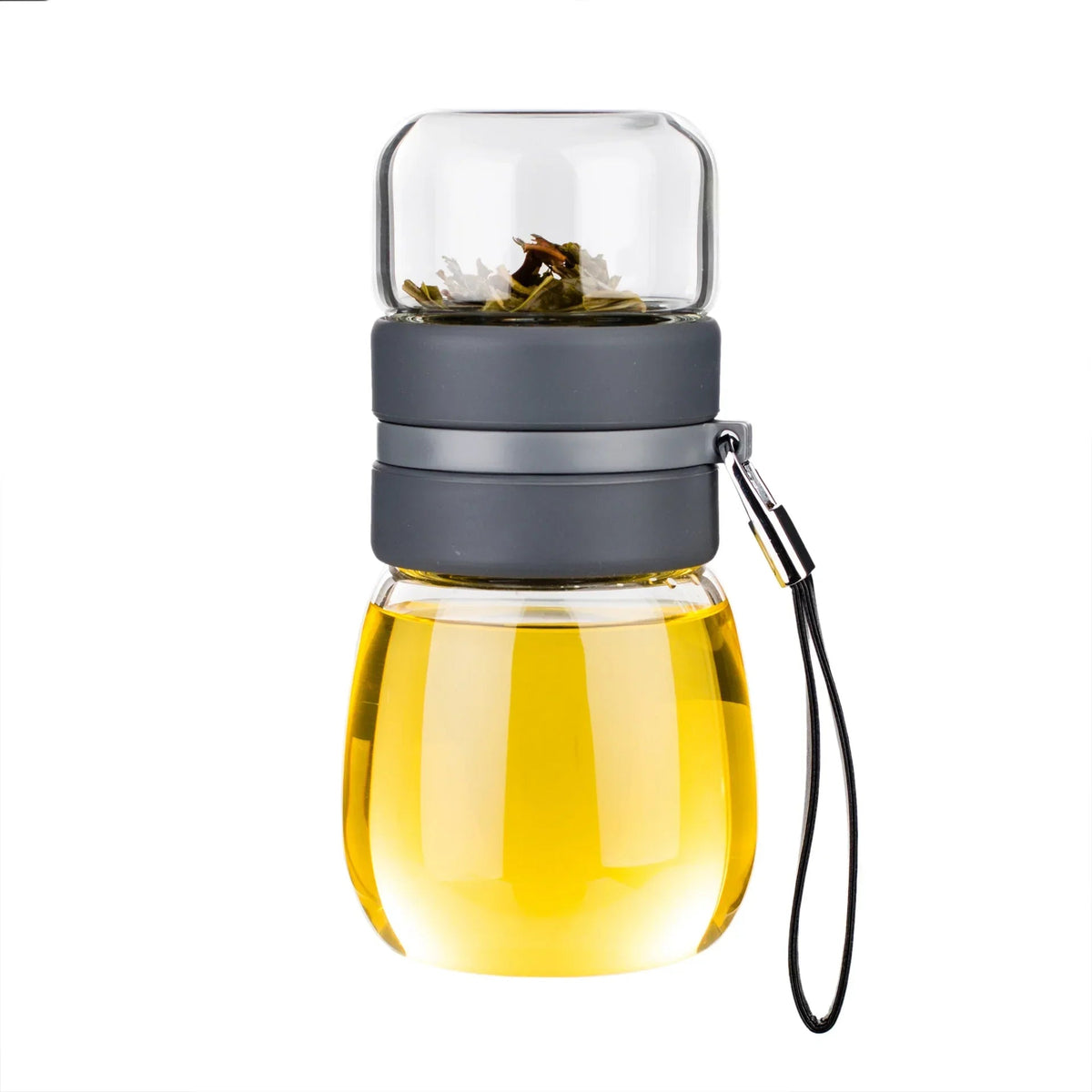 Compact glass teapot with infuser and lid, top-down view
