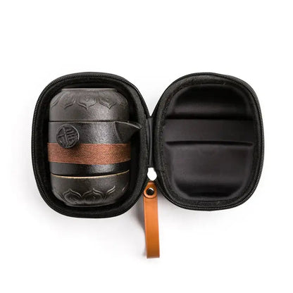 Mini nomadic tea set unpacked outdoors for camping or hiking trip