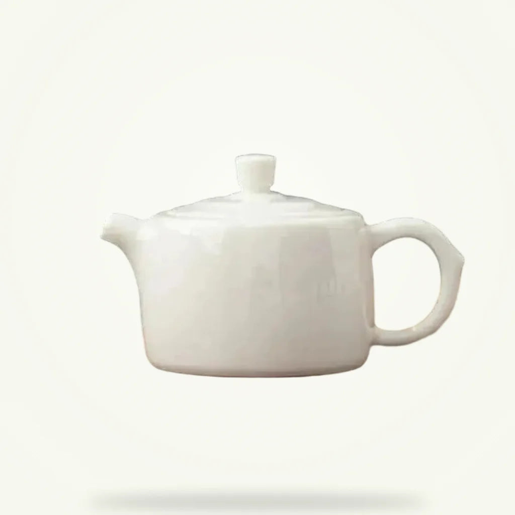 Mini Porcelain Teapot for One, 100 ml Handcrafted Teapot, product photo on a plain background