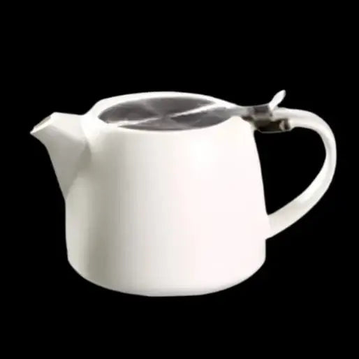 White modern ceramic teapot with saucer