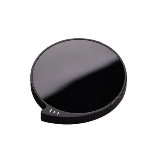 Black cup warmer for tea with a ceramic mug