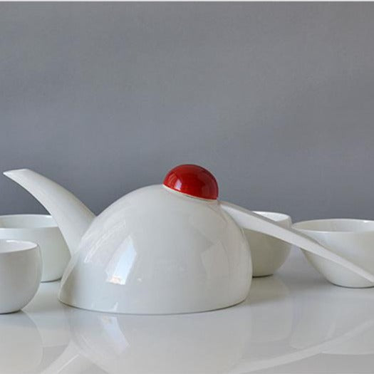Porcelain teapot and cup on a ceramic tray, Granny Lulu selection