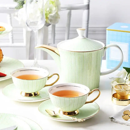 Modern porcelain teapot set with cups and kettle