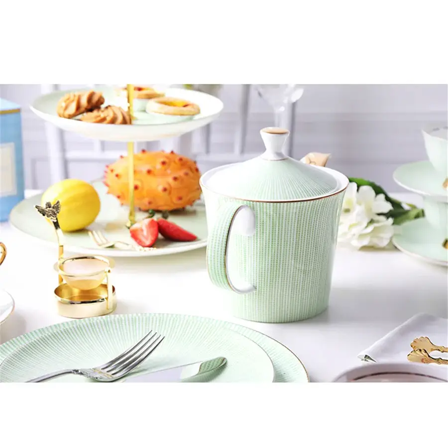 Porcelain teapot set with saucers and dessert plates