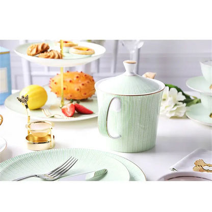 Porcelain teapot set with saucers and dessert plates