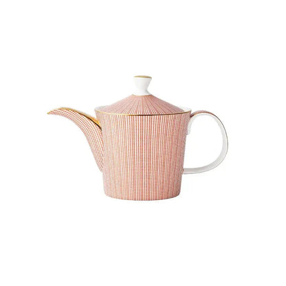 Red porcelain teapot set with matching cups