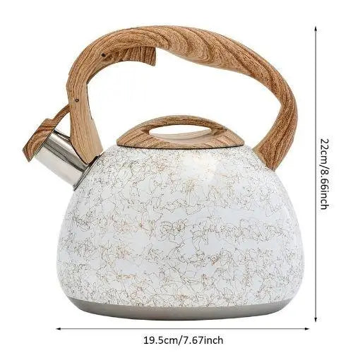 Vintage cream teapot showing size on counter