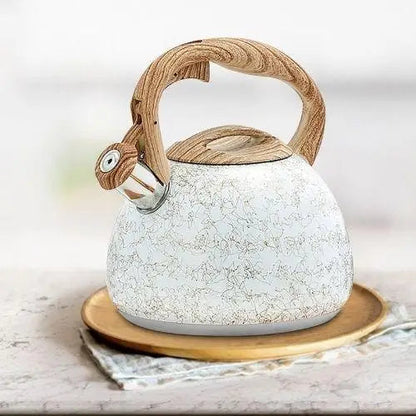 Elegant cream whistling teapot display