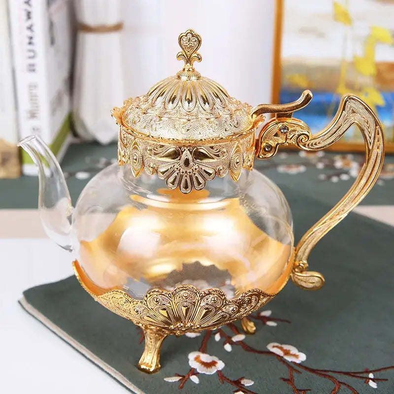 Moroccan glass teapot in gold finish with tea