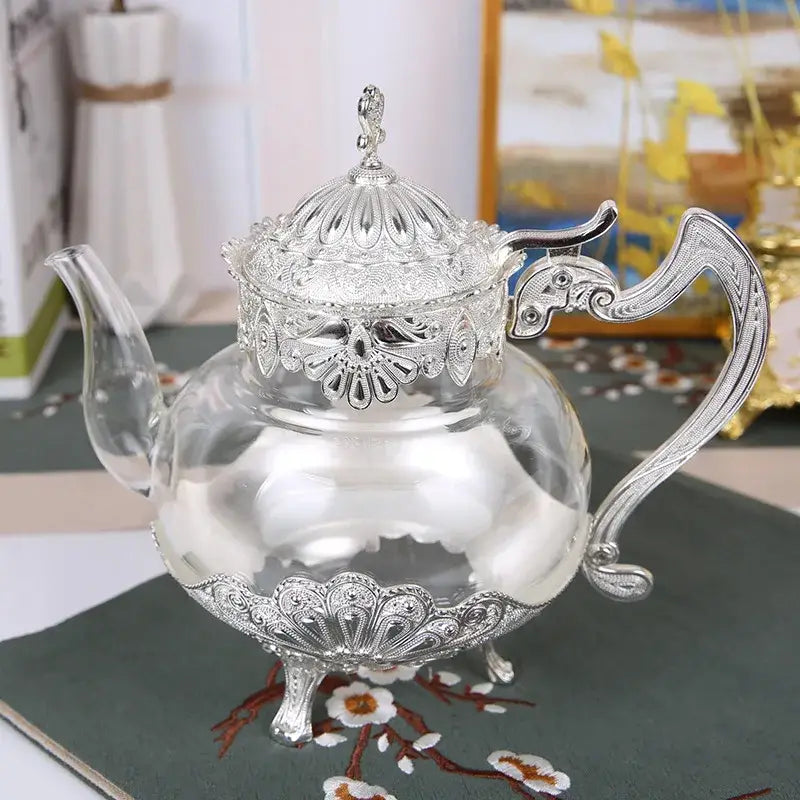 Moroccan glass teapot in silver finish with tea