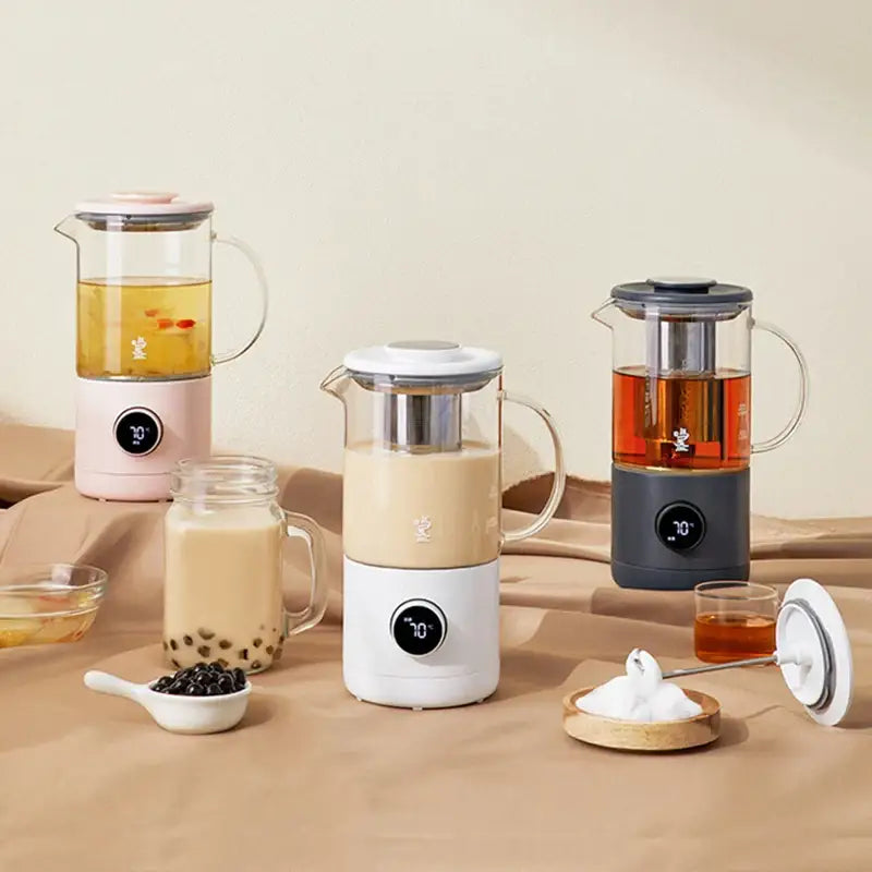 White 500ml multifunction tea maker on kitchen countertop, side view